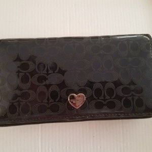 Coach perforated liquid gloss clutch
